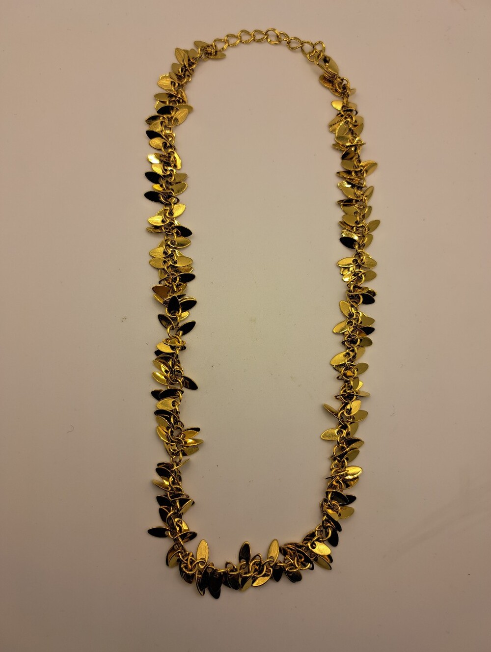 Vintage gold-tone fringe leaf necklace designed by Philip Bloch 18"